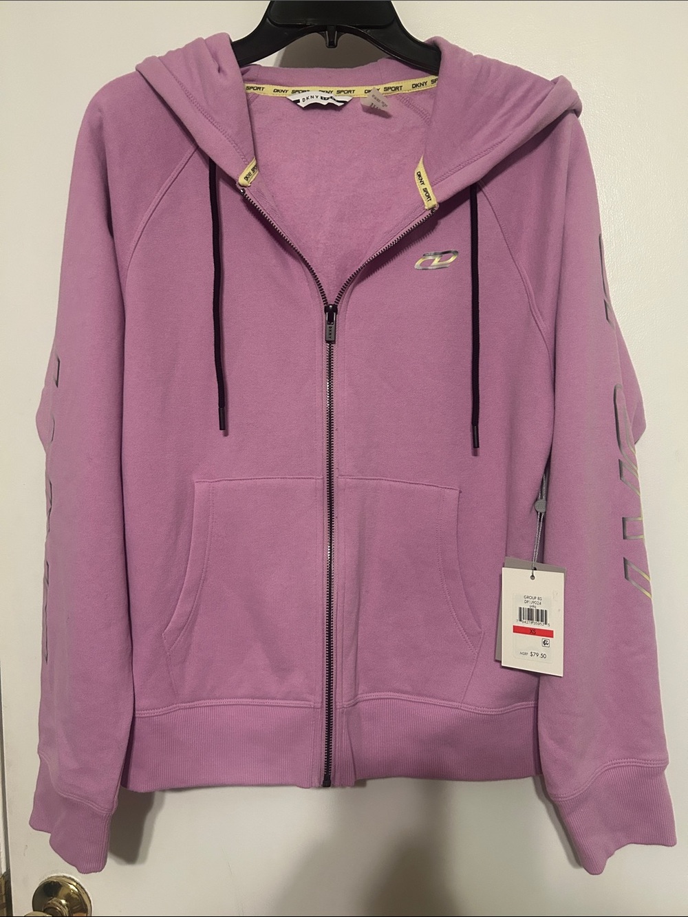 DKNY sport hoodie. It’s XS but pretty roomy and unique purplish color.